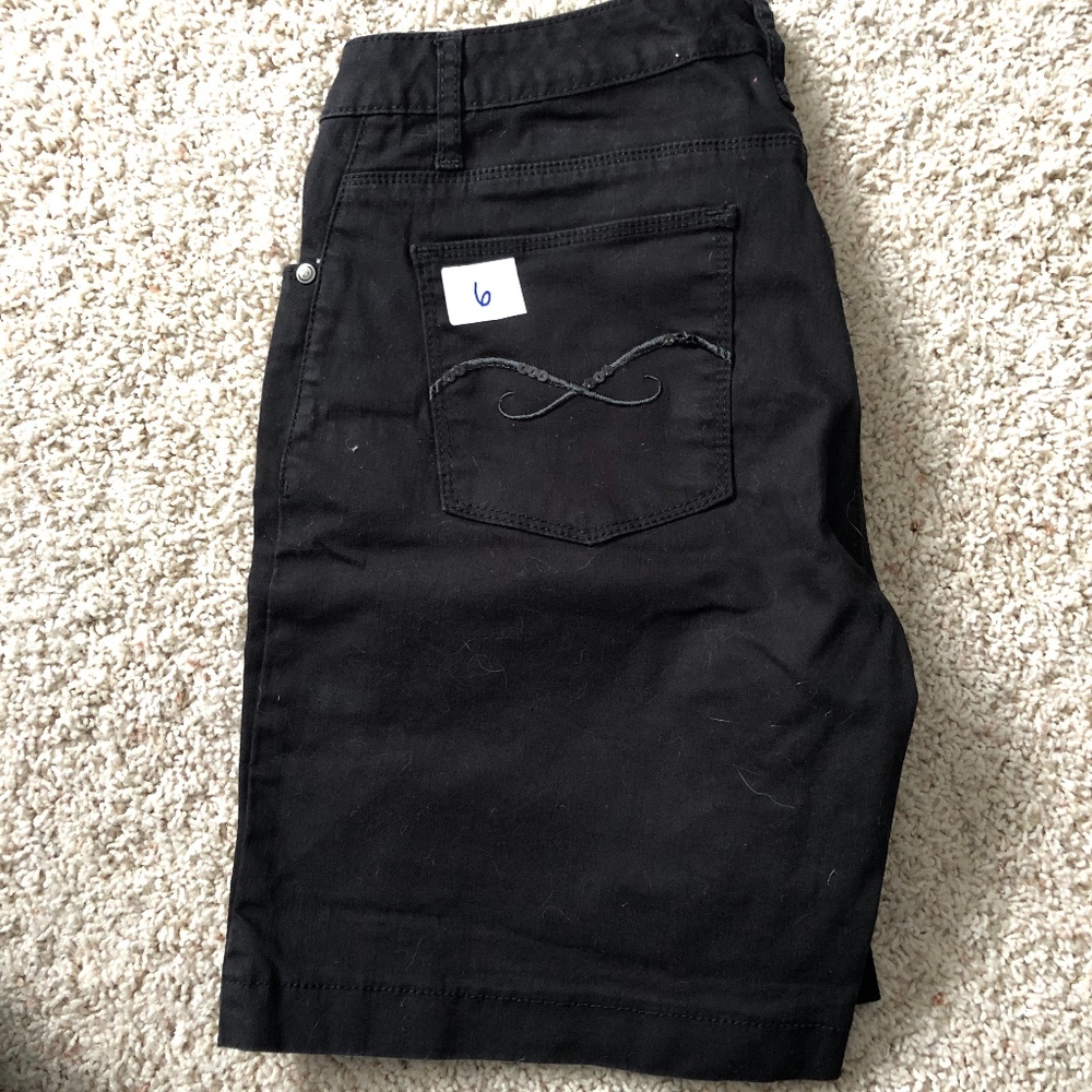 Women's mid-length black shorts
